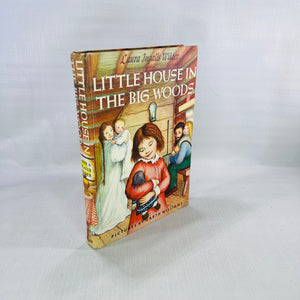 Little House in the Big Woods by Laura Ingalls Wilder Illustrated by Garth Williams 1953 Harper and Row Publishers