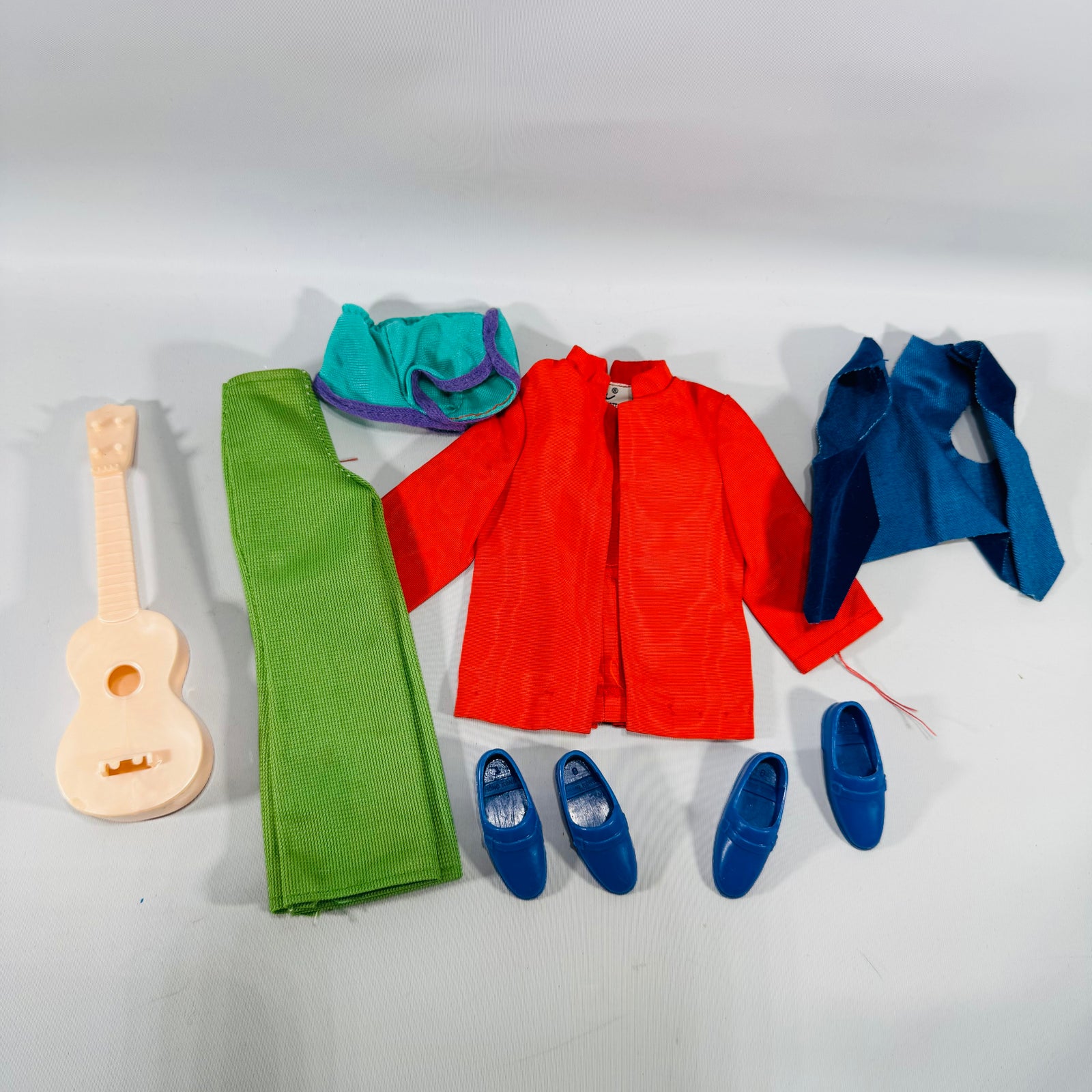Vintage Mattel Ken Clothing & Accessory Bundle (9 Pieces) — Tagged Red Jacket, Green Pants, Blue Loafers + Guitar