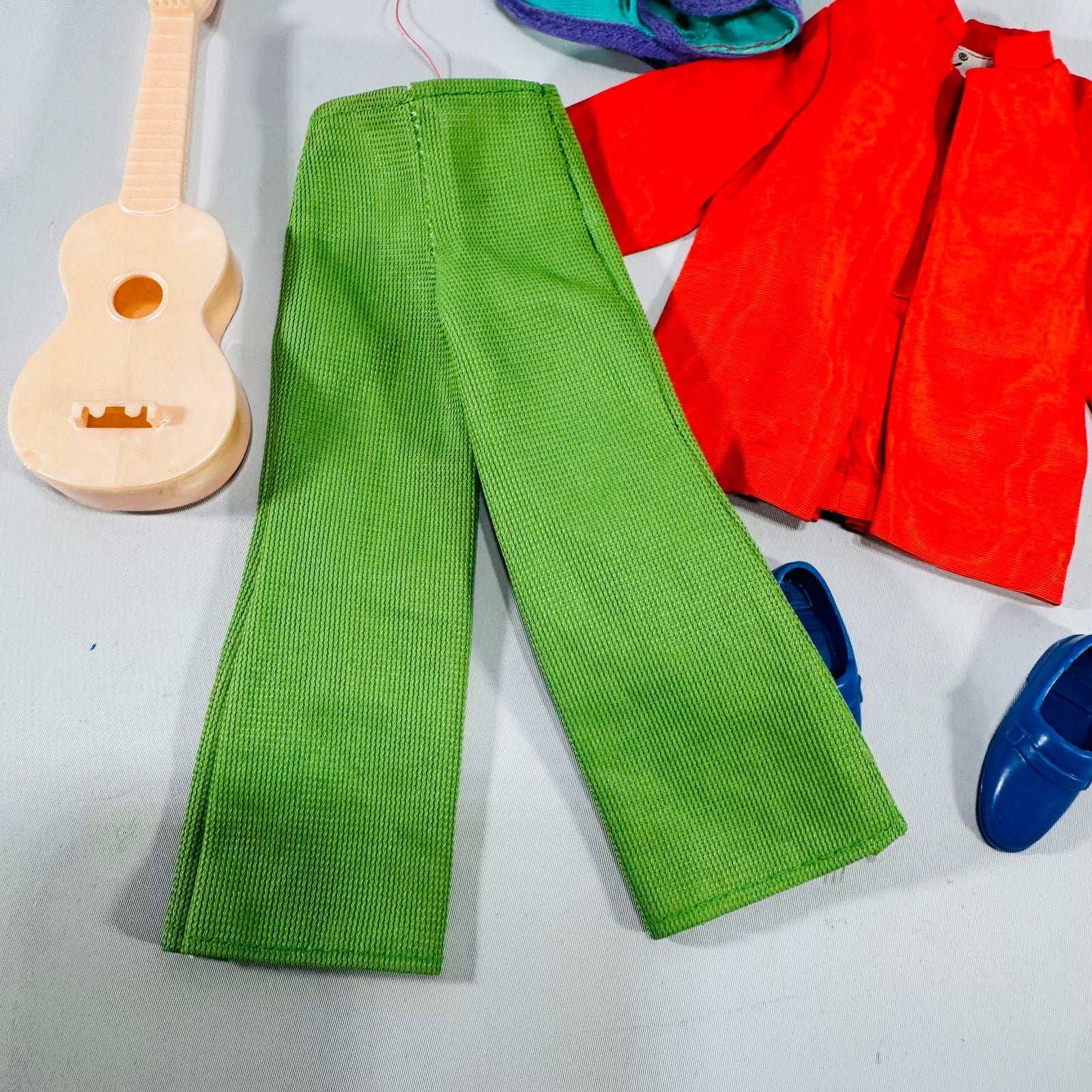 Vintage Mattel Ken Clothing & Accessory Bundle (9 Pieces) — Tagged Red Jacket, Green Pants, Blue Loafers + Guitar