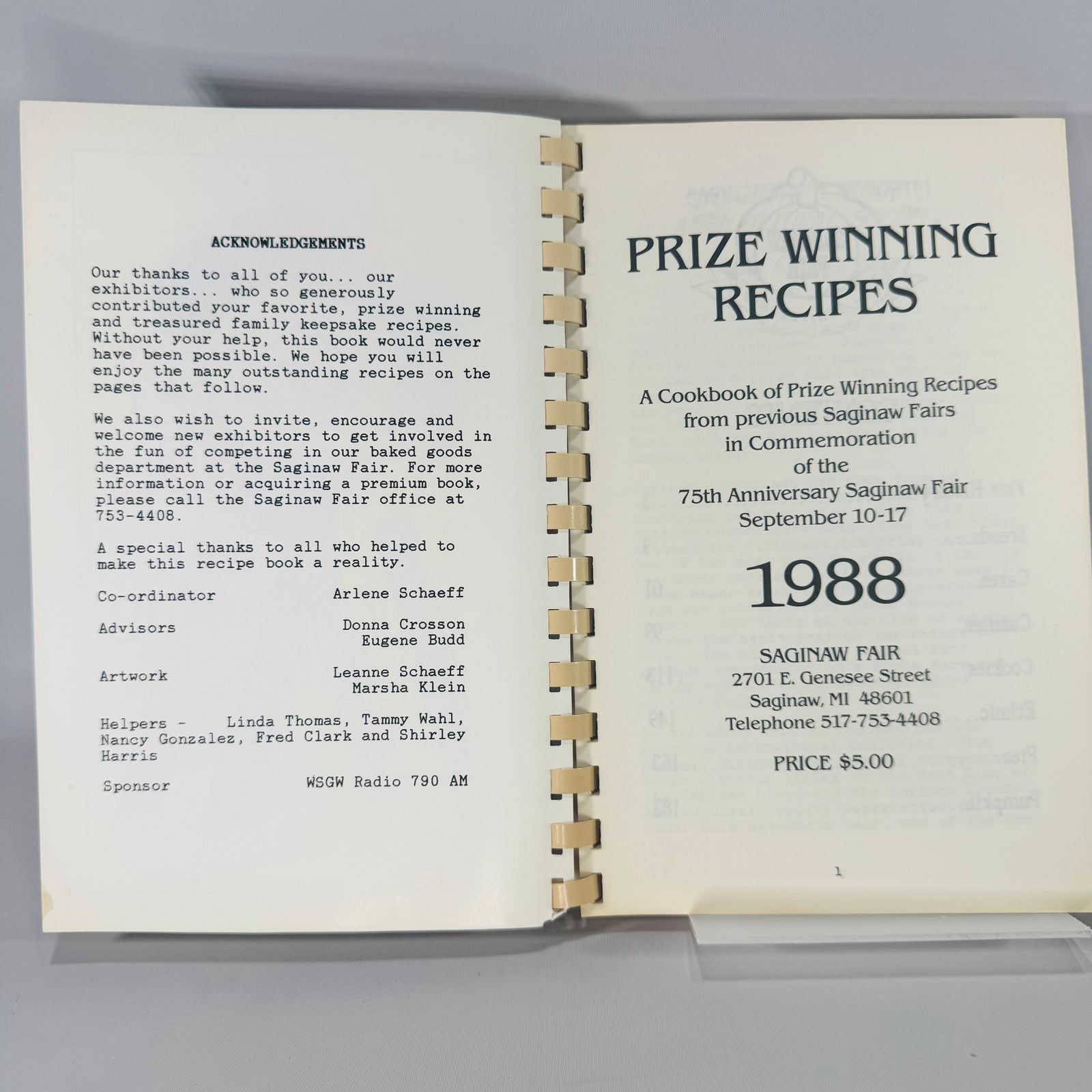 Prize Winning Recipes” (1988 Saginaw Fair) cookbook with red, white, and blue ribbon graphic and 75th anniversary emblem.