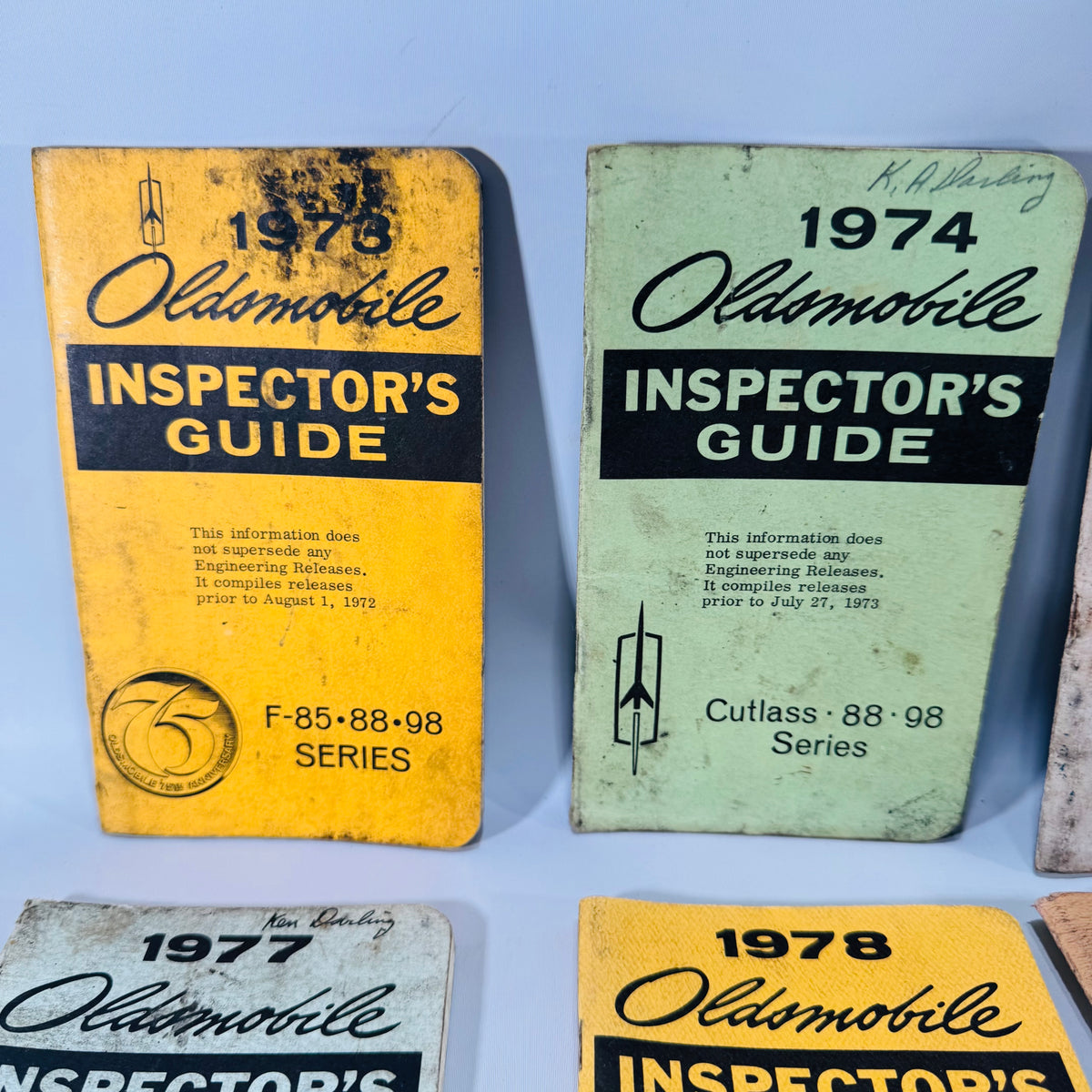 Vintage Oldsmobile Inspector’s Guide Lot (1973–1979) — 8 Pocket Manuals, Codes & Specs (Cutlass / 88 / 98 / F-85 / A-B-C)