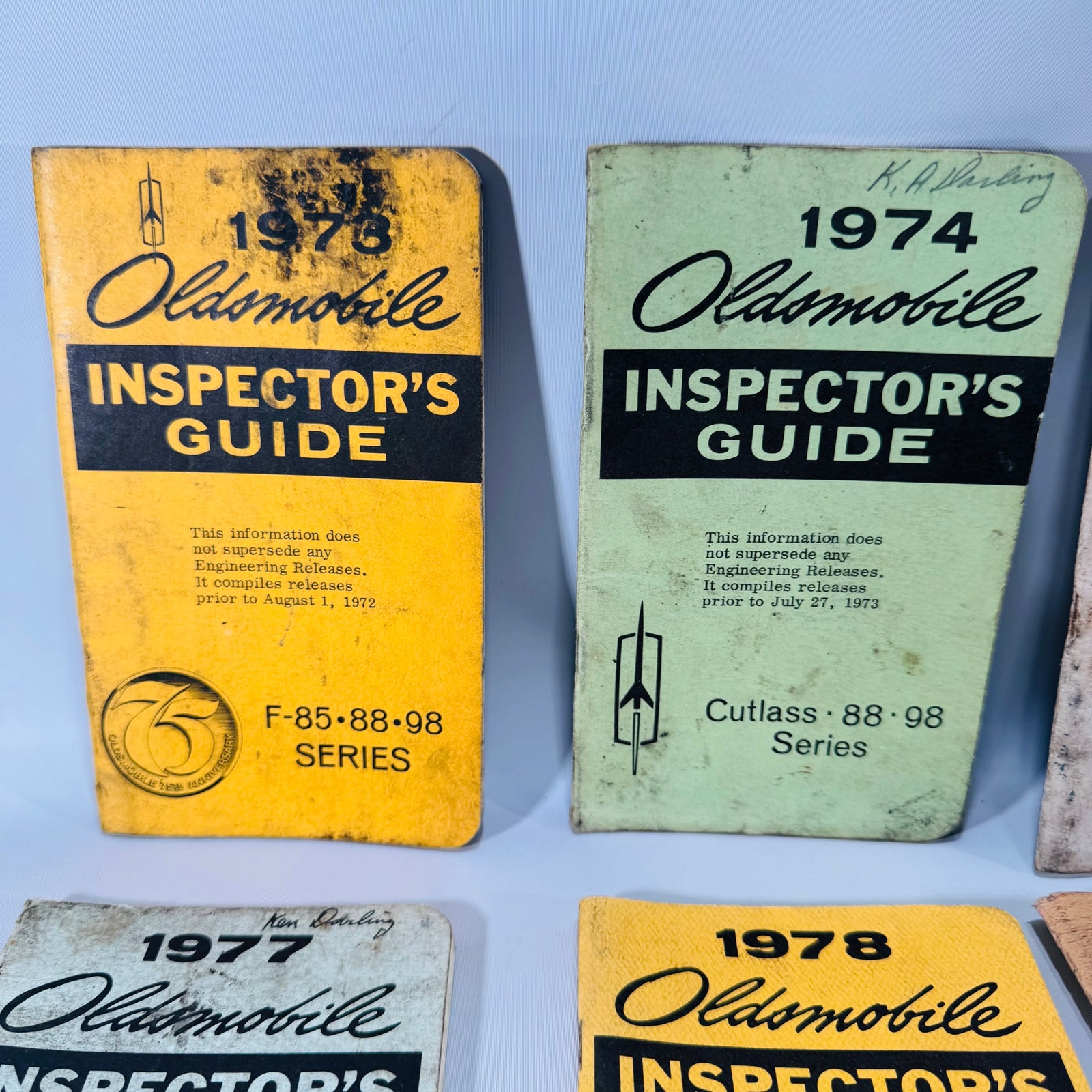 Vintage Oldsmobile Inspector’s Guide Lot (1973–1979) — 8 Pocket Manuals, Codes & Specs (Cutlass / 88 / 98 / F-85 / A-B-C)
