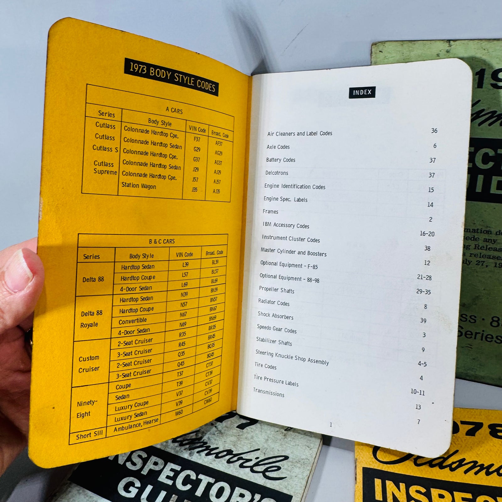Vintage Oldsmobile Inspector’s Guide Lot (1973–1979) — 8 Pocket Manuals, Codes & Specs (Cutlass / 88 / 98 / F-85 / A-B-C)