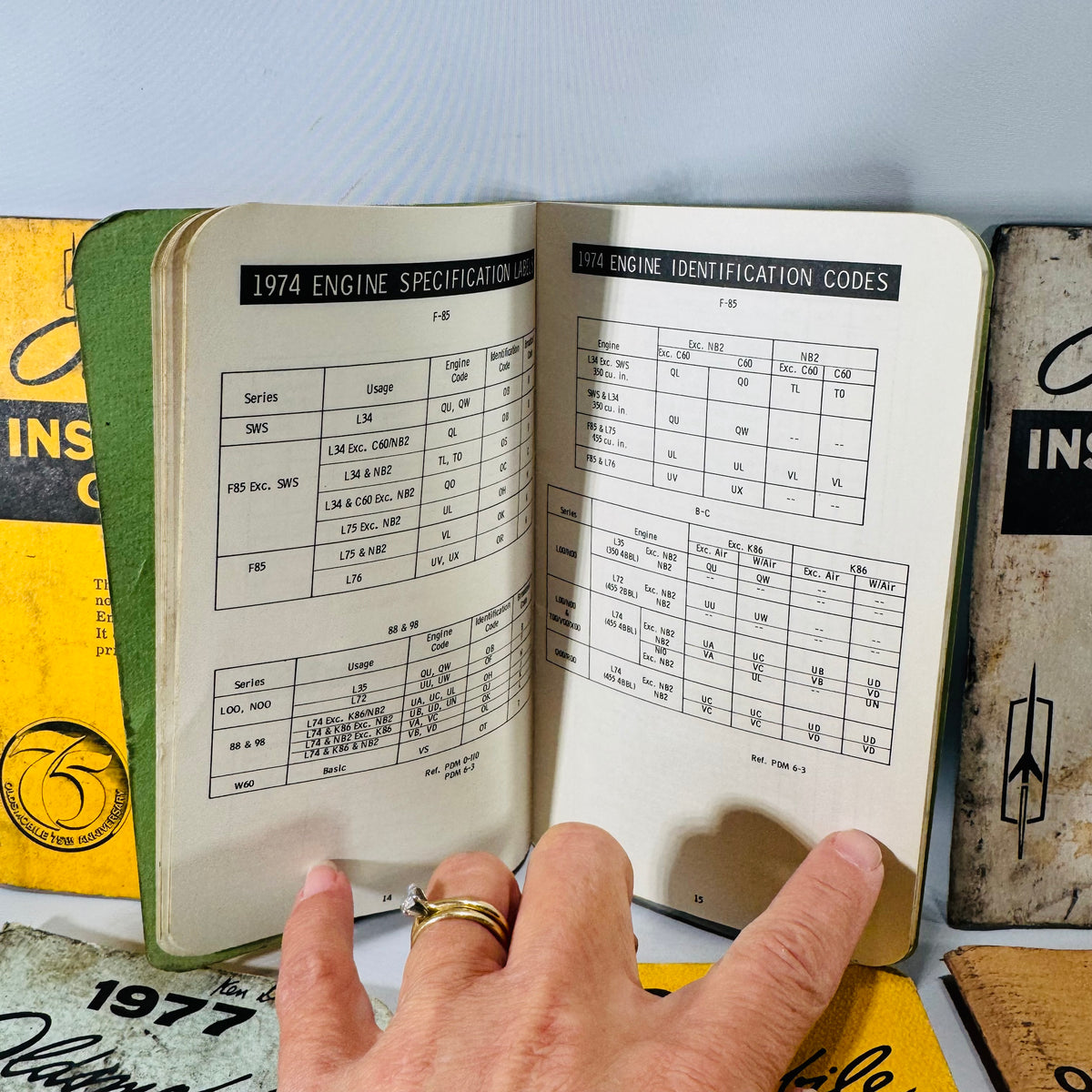 Vintage Oldsmobile Inspector’s Guide Lot (1973–1979) — 8 Pocket Manuals, Codes & Specs (Cutlass / 88 / 98 / F-85 / A-B-C)