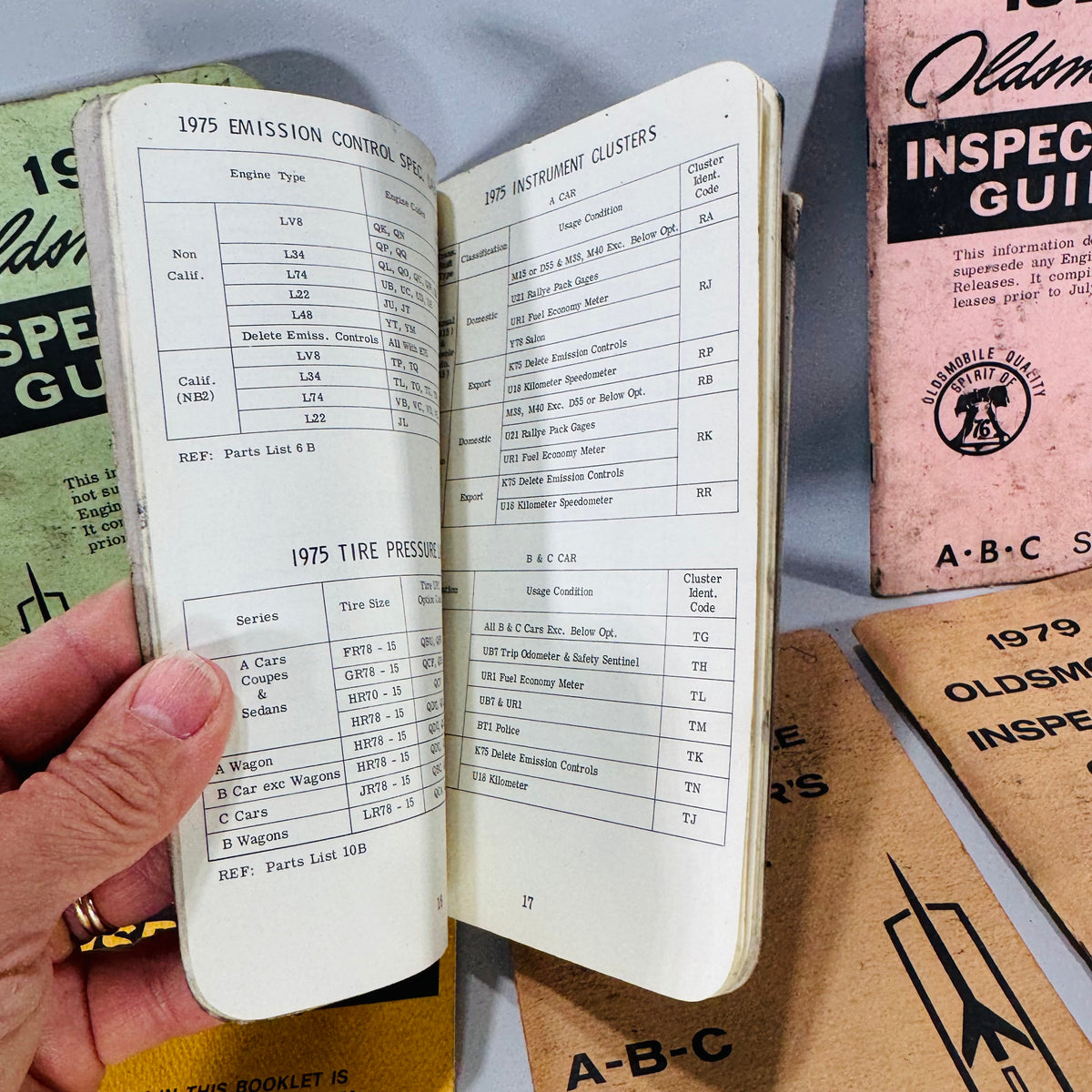 Vintage Oldsmobile Inspector’s Guide Lot (1973–1979) — 8 Pocket Manuals, Codes & Specs (Cutlass / 88 / 98 / F-85 / A-B-C)