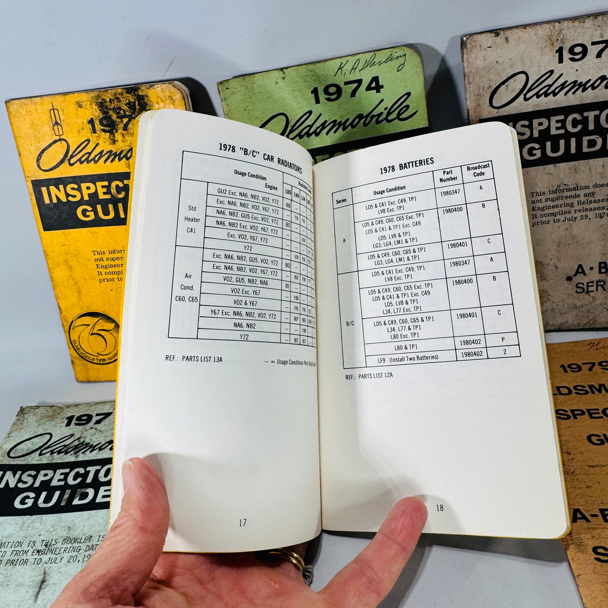 Vintage Oldsmobile Inspector’s Guide Lot (1973–1979) — 8 Pocket Manuals, Codes & Specs (Cutlass / 88 / 98 / F-85 / A-B-C)
