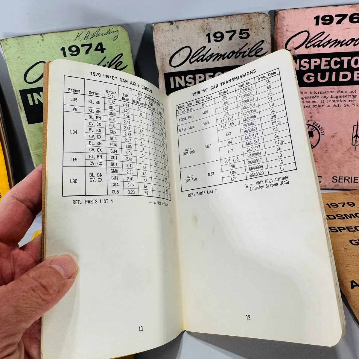 Vintage Oldsmobile Inspector’s Guide Lot (1973–1979) — 8 Pocket Manuals, Codes & Specs (Cutlass / 88 / 98 / F-85 / A-B-C)