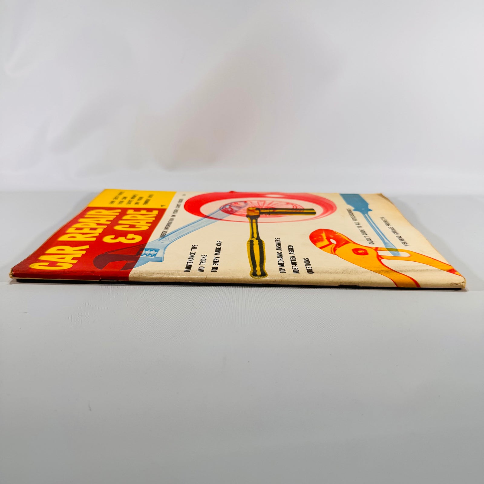 Car Repair and Care 1950s lying flat, side view