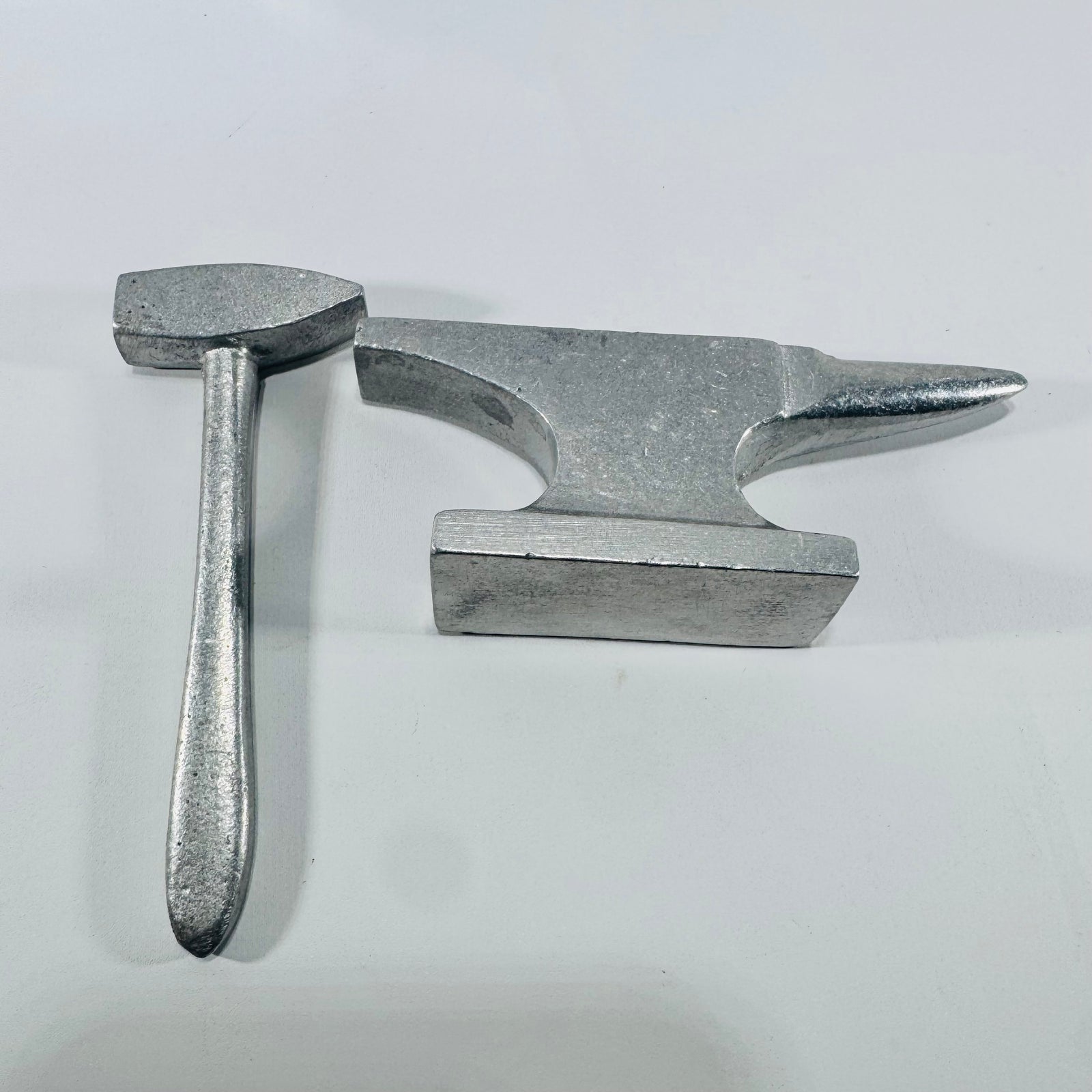 L.L.H. Miniature Anvil and Hammer 1970s Cast Metal Wilton Armetale Attribution