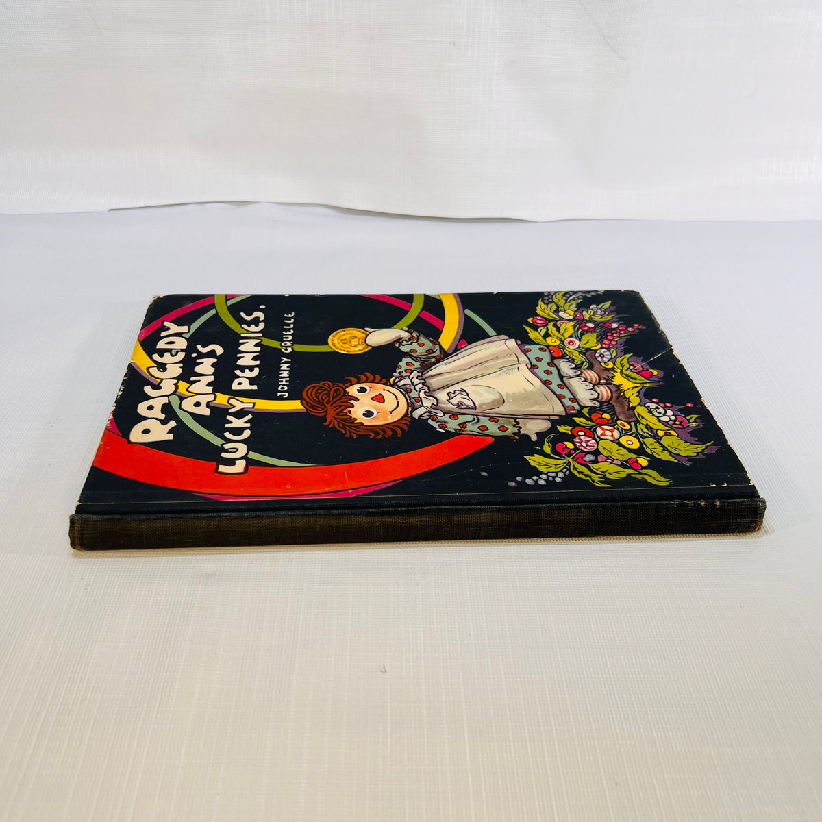 Raggedy Ann's Lucky Pennies written and illustrated by Johnny Gruelle 1932 M. A. Donohue & Company