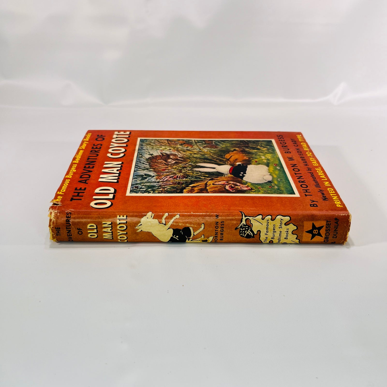 Dust jacket spine of The Adventures of Old Man Coyote by Thornton W. Burgess