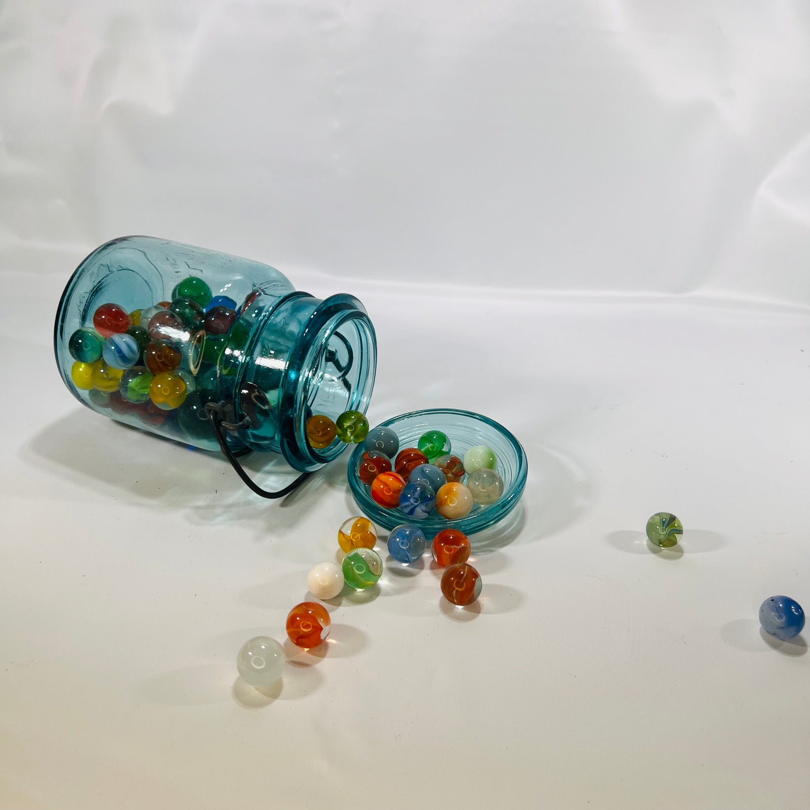 Blue Ideal Pint Mason Jar with Wire Slide Glass Lid filled with Colorful Marbles Vintage Decor