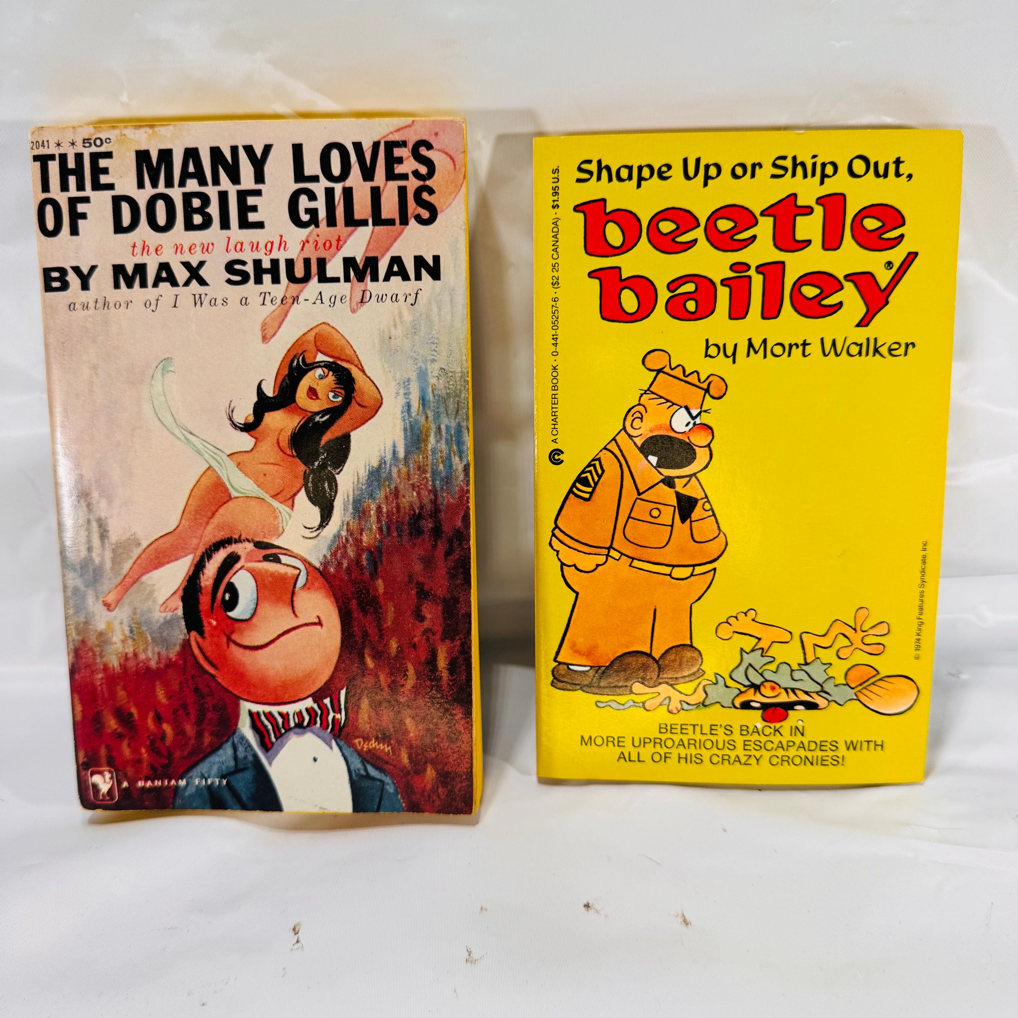 Shape Up or Ship Out by Mort Walker (1985) & The Many Loves of Dobie Gillis by Max Shulman (1951), Paperback Bundle