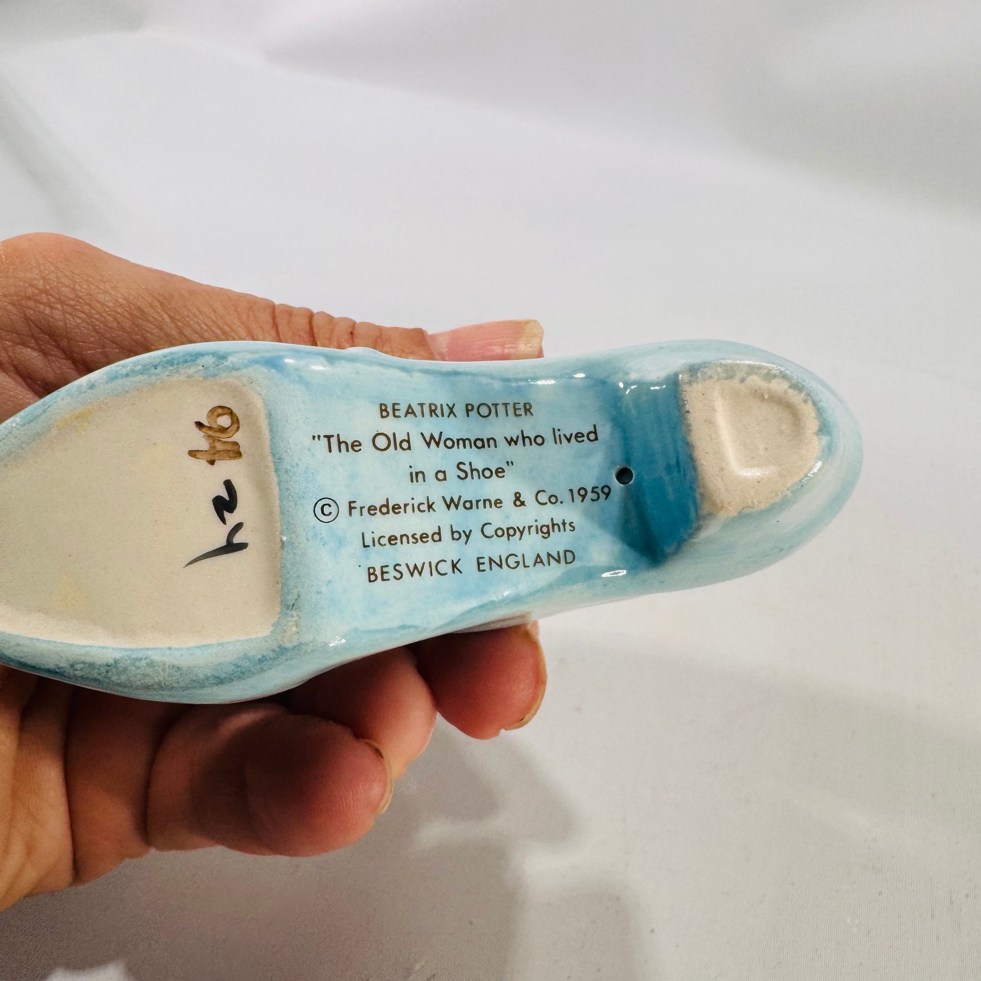 Beatrix Potter Beswick Figurine — “The Old Woman Who Lived in a Shoe” (1959)