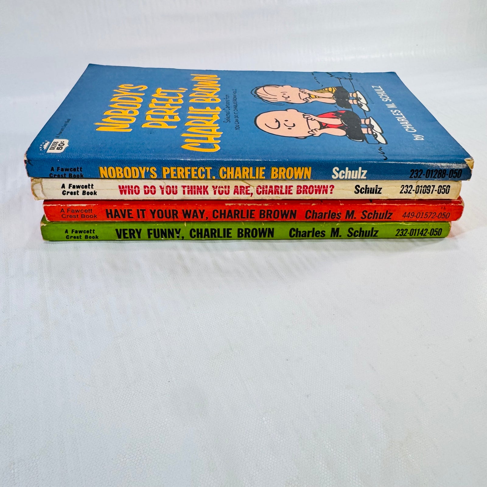 Charlie Brown Peanuts Fawcett Crest Paperback Lot of 4 by Charles M. Schulz