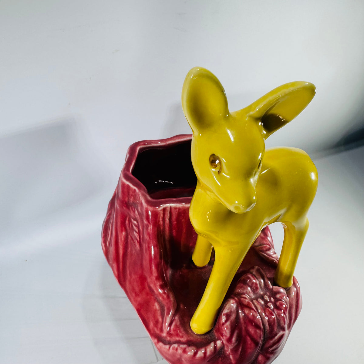 Vintage Shawnee Pottery Deer Planter | yellow fawn ceramic figural planter on maroon stump base