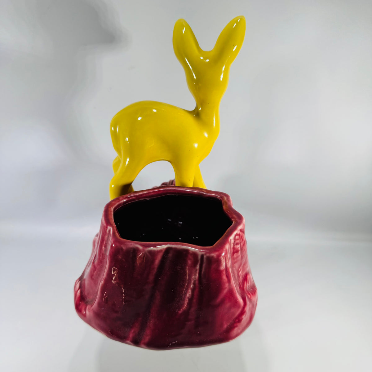 Vintage Shawnee Pottery Deer Planter | yellow fawn ceramic figural planter on maroon stump base