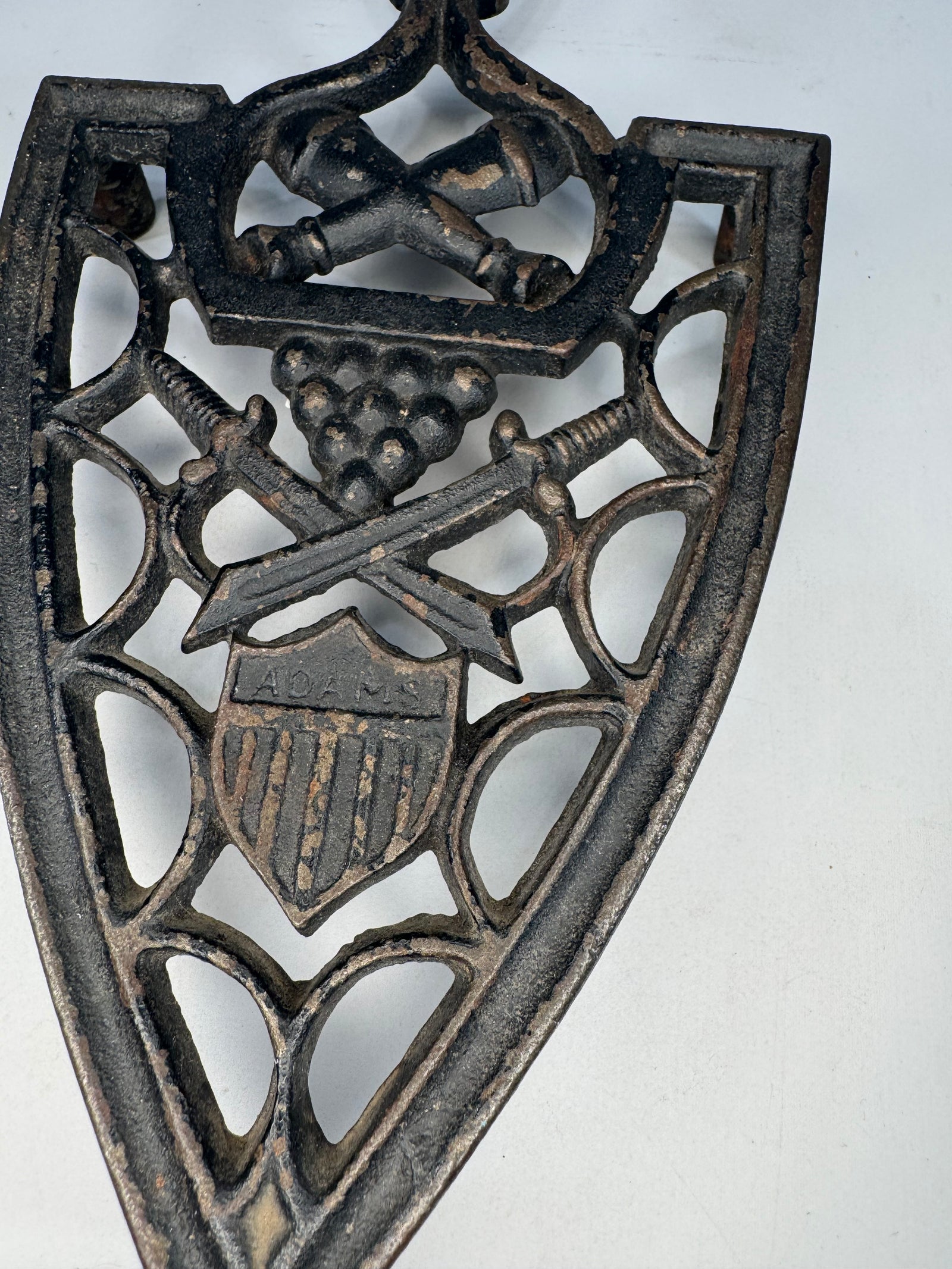 Vintage Cast Iron Sad Iron Trivet Military Patriotic Design