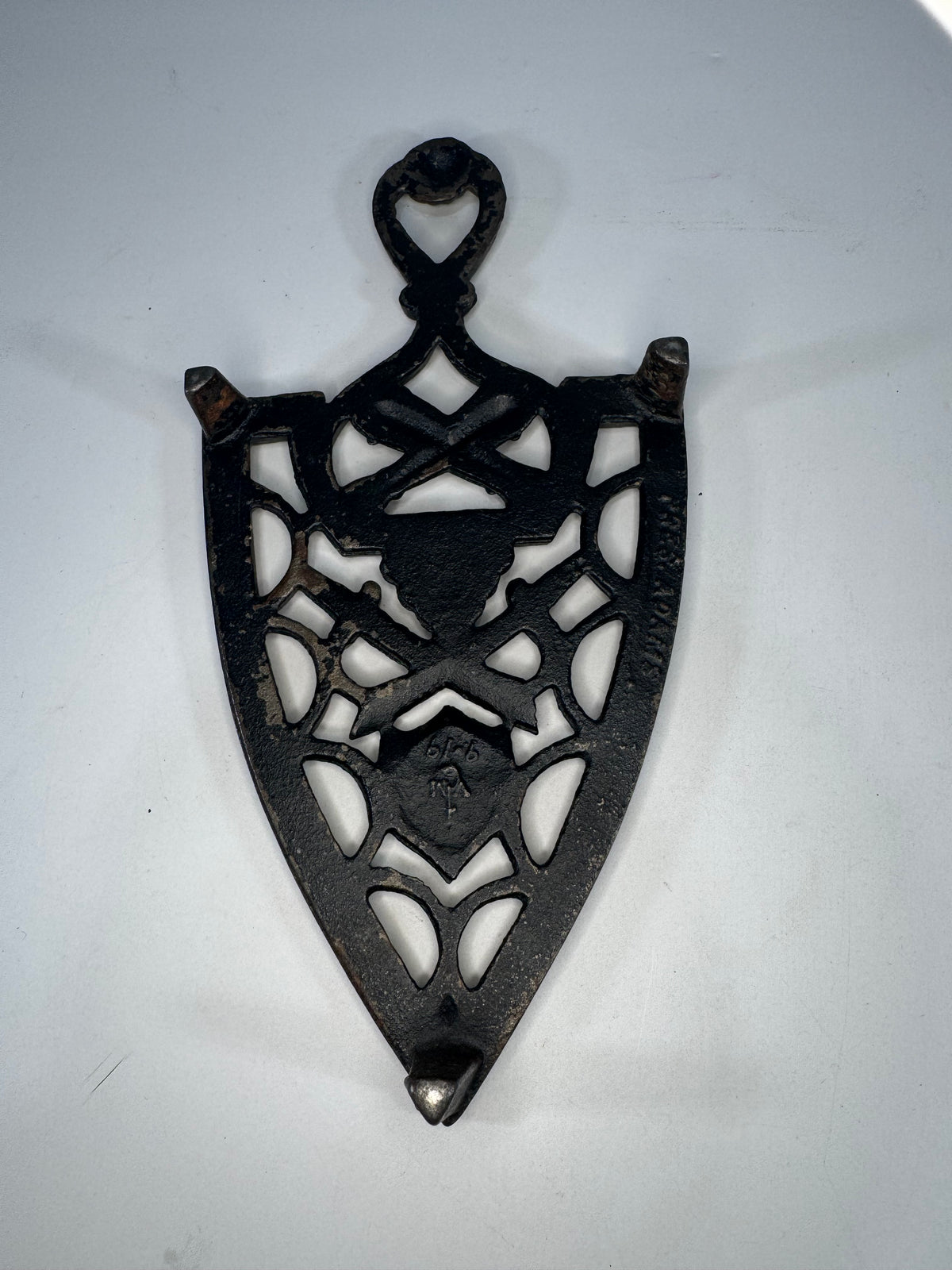 Vintage Cast Iron Sad Iron Trivet Military Patriotic Design