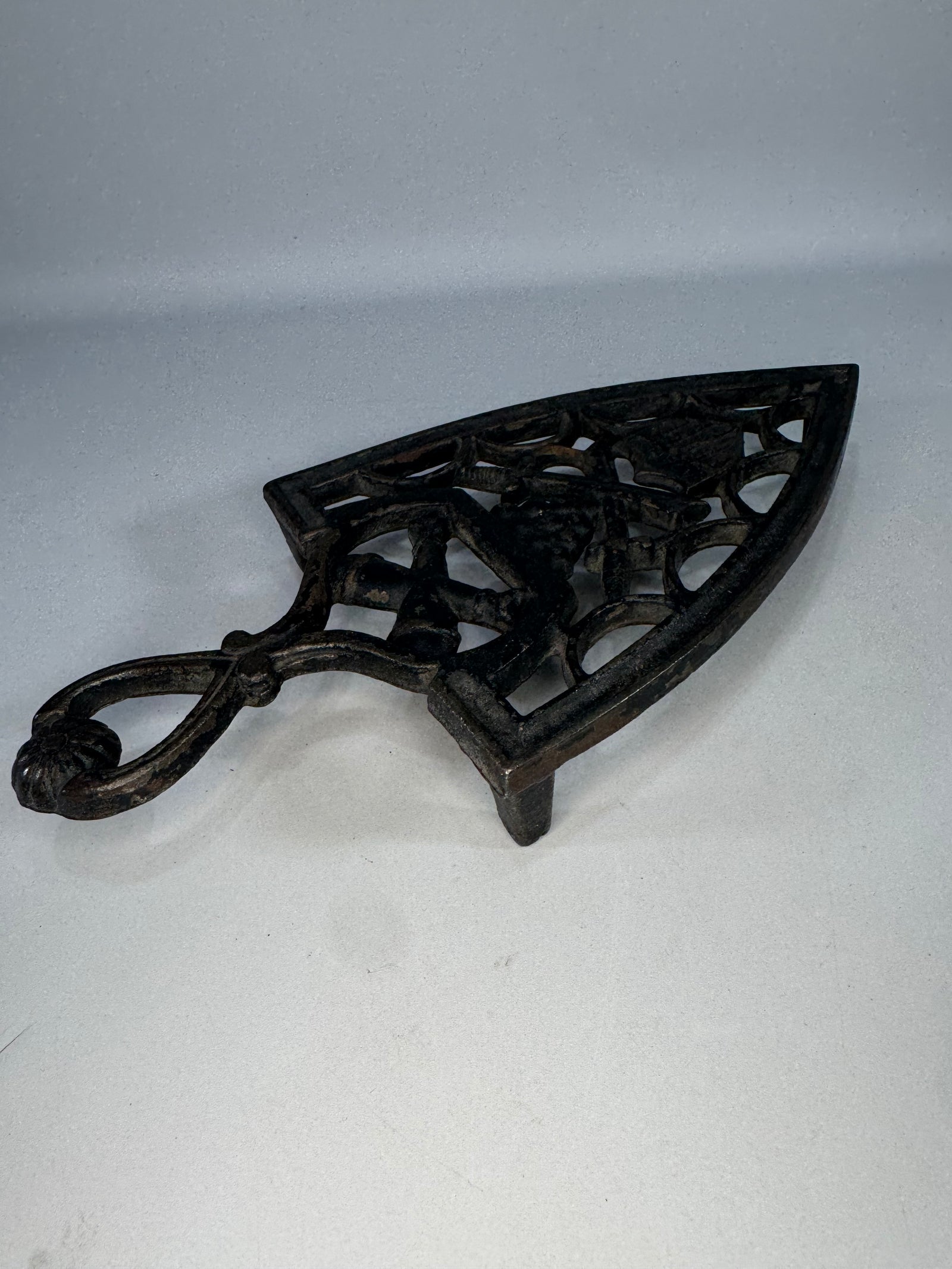 Vintage Cast Iron Sad Iron Trivet Military Patriotic Design