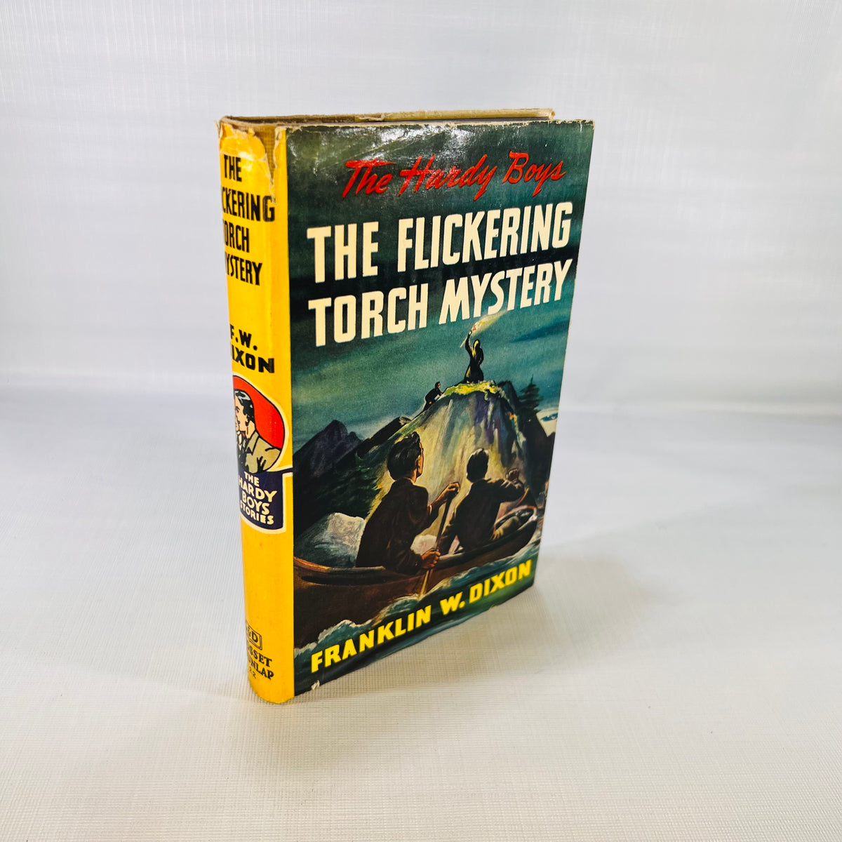 The Hardy Boys The Flickering Torch Mystery 1943, front of the pictorial dust jacket