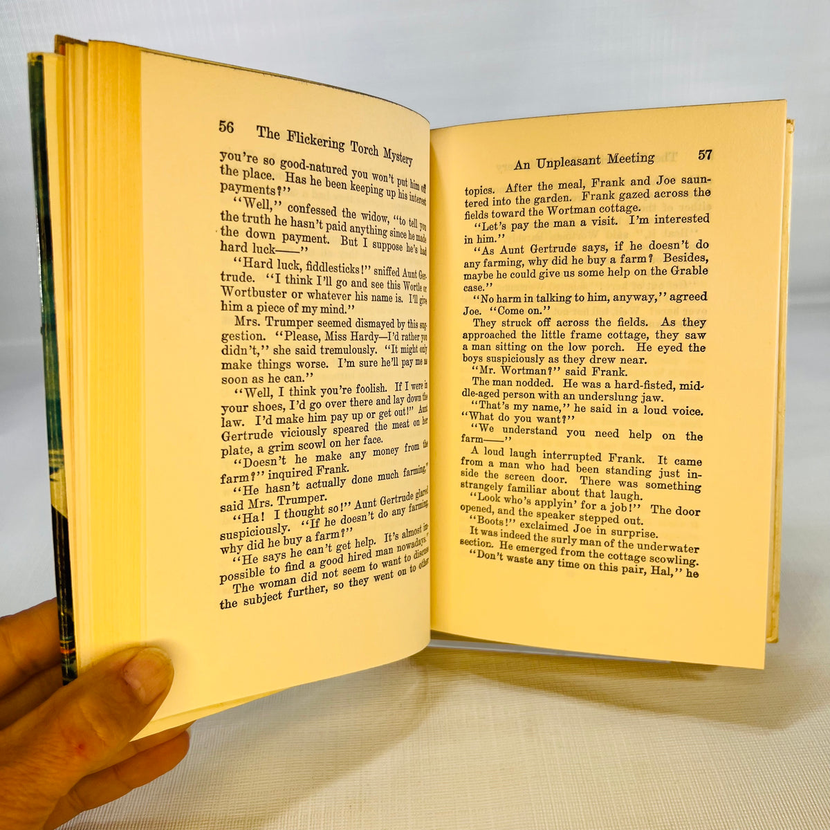 Text pages 56 and 57 from An Unpleasant Meeting, The Flickering Torch Mystery