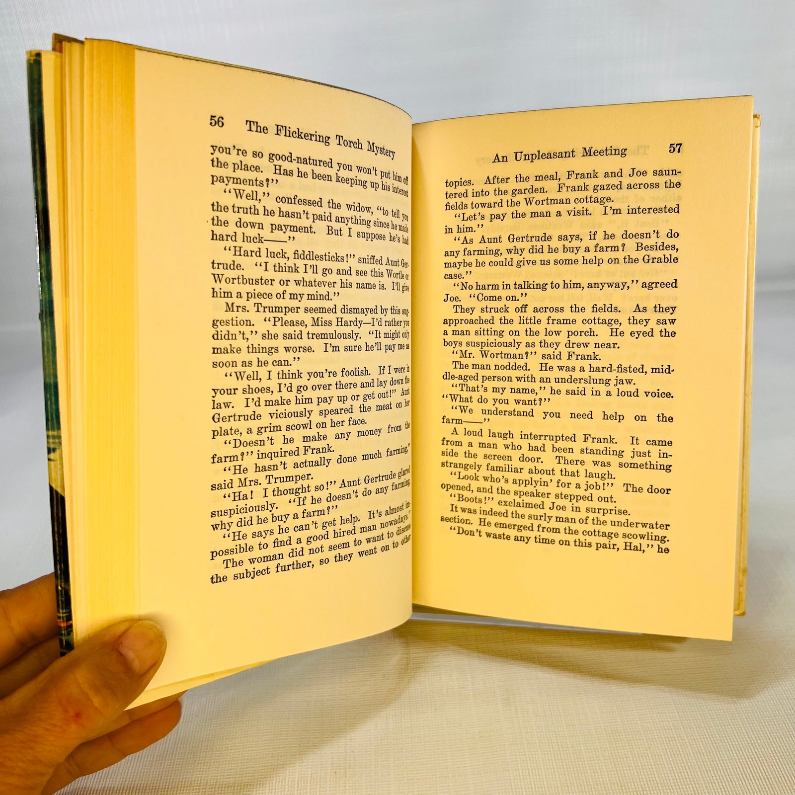 Text pages 56 and 57 from An Unpleasant Meeting, The Flickering Torch Mystery