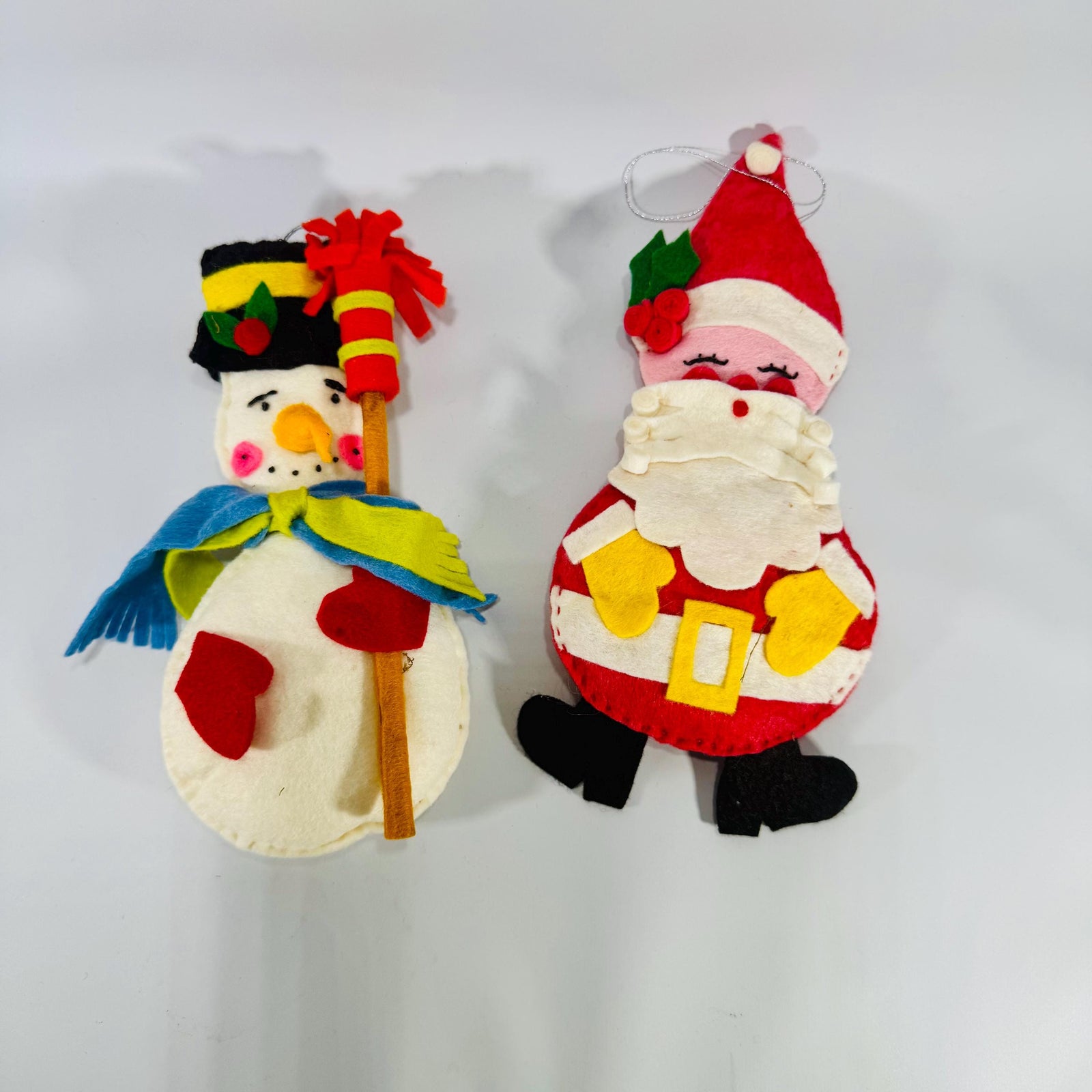 Large handmade felt Santa and snowman ornaments—8.6 inches tall each, layered felt with stitching and stuffing, shown on a light background.
