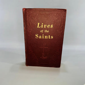 Burgundy vintage hardcover Lives of the Saints with gilt title and embossed design, plus interior title page showing Catholic Book Publishing Co. and illustrated saint pages.