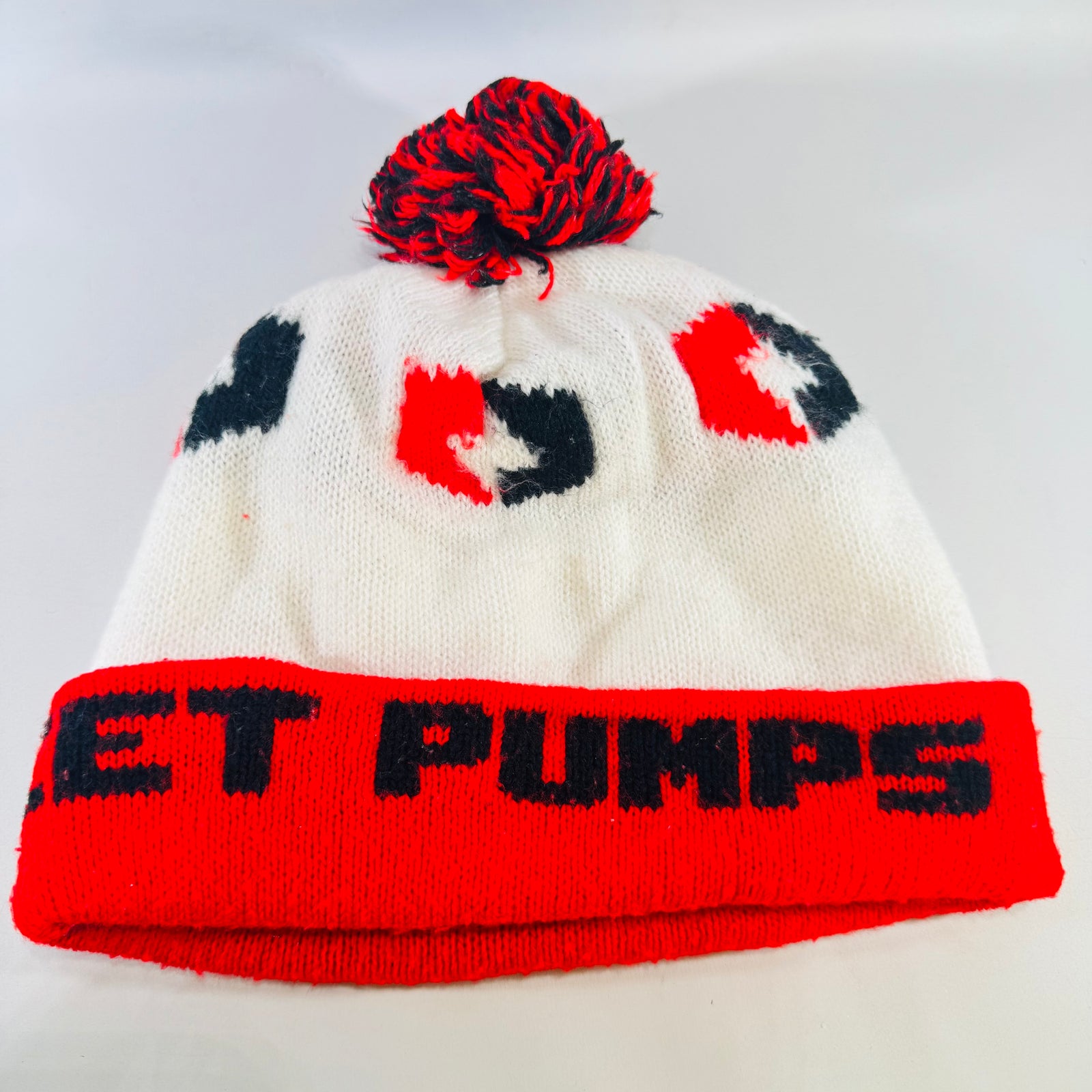 Red Jacket Pumps Pom Pom Beanie 1970s 1980s Industrial Advertising Hat