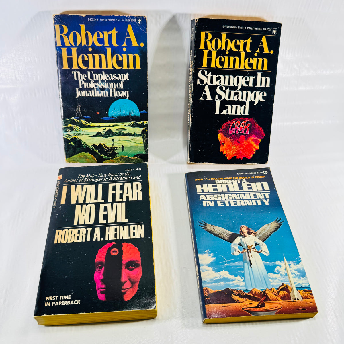 Stranger in a Strange Land Robert A. Heinlein 4 Paperback Bundle with I Will Fear No Evil, Jonathan Hoag, Assignment in Eternity