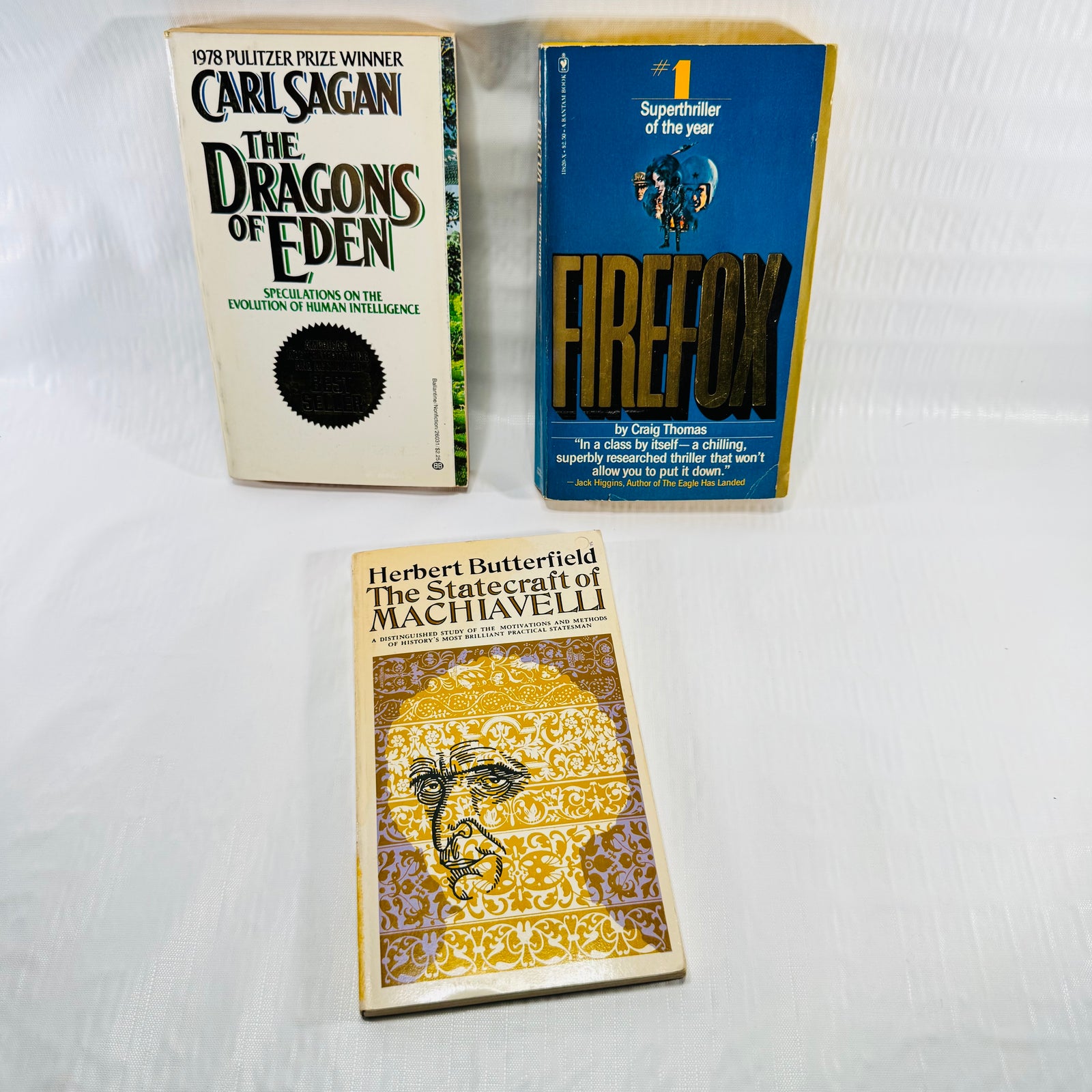 The Dragons of Eden, Firefox, Statecraft of Machiavelli 3 Book Lot