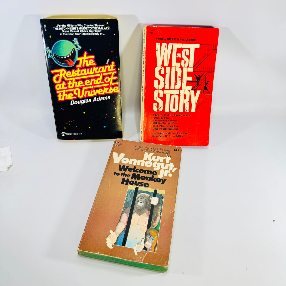 The Restaurant at the End of the Universe + West Side Story + Welcome to the Monkey House 3 Book Lot