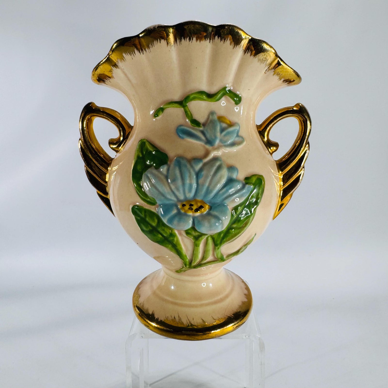 Vintage Hull Art pottery vase with blue raised flowers and gold trim, marked H-6-6½ USA, shown on white background.