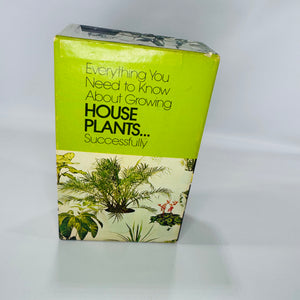 Vintage Popular Library indoor gardening boxed set in green slipcase with four plant-care paperbacks (terrariums, water gardening, grow lights, house plants), visible page toning and light wear.