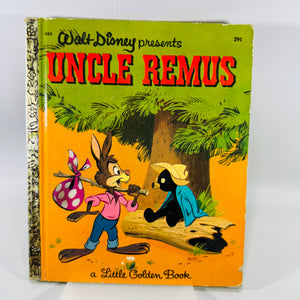 Vintage Walt Disney presents Uncle Remus Little Golden Book with green/orange 39¢ cover, D85 code, patterned spine, and visible edge wear.