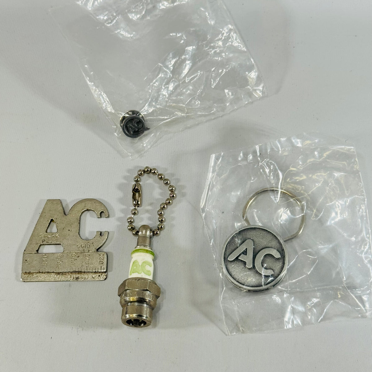 AC Delco Vintage Promotional Collectible Bundle — Keychain, Gauge, Spark Plug
