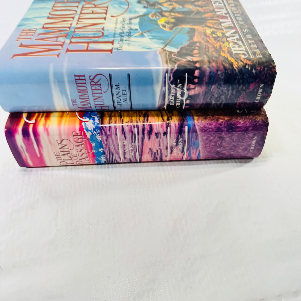 Spines of both books side by side with Crown printed at the base