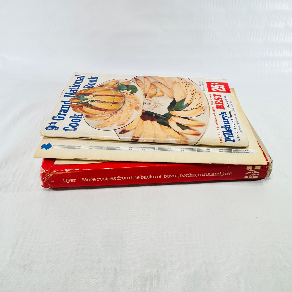 Angled stack showing the Pillsbury cover and the Dyer red spine