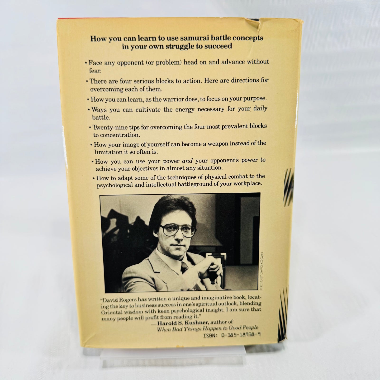 Back dust jacket of Fighting to Win with author photo of David J. Rogers and a Harold S. Kushner blurb.