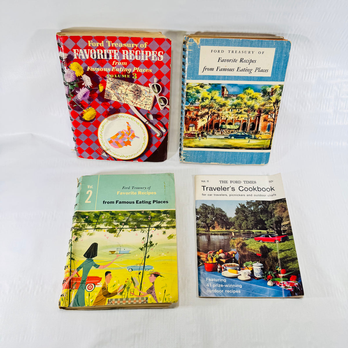 Four Ford cookbooks, three Treasury volumes and the Ford Times Traveler's Cookbook
