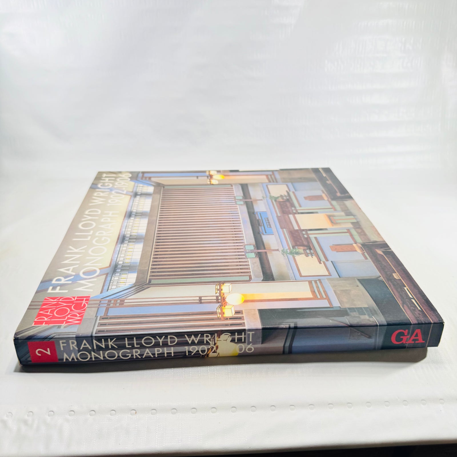 Angled spine view of Frank Lloyd Wright Monograph 1902-1906 Volume 2 softcover