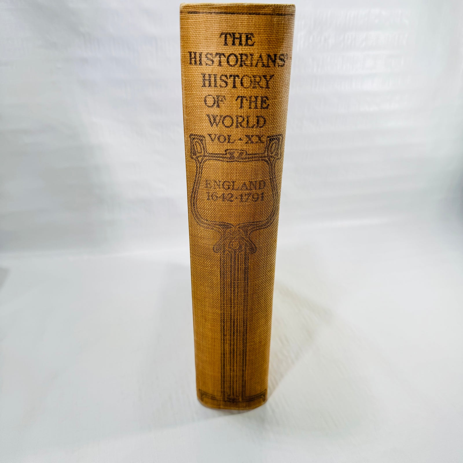 Spine of The Historians' History of the World Vol XX, England 1642-1791, tan cloth with black Art Nouveau stamping.