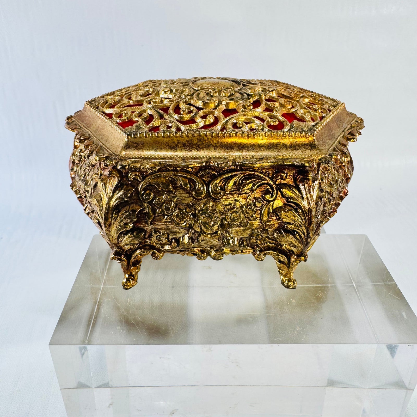 Vintage ornate gold tone metal jewelry casket with red fabric lining, photograph 1 of 9