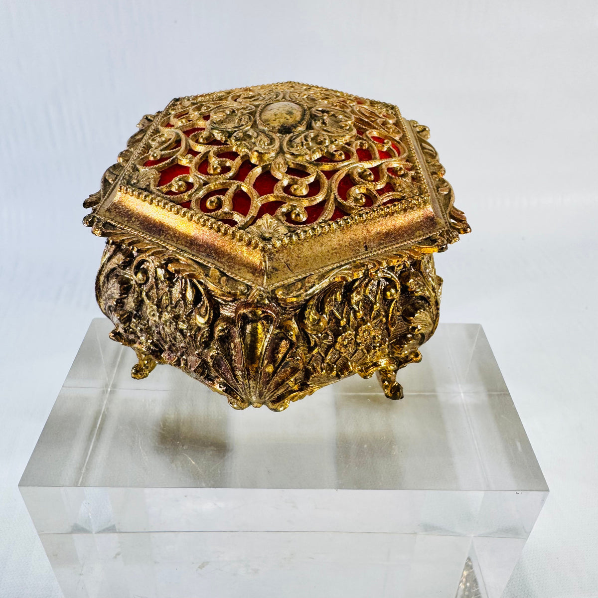 Vintage ornate gold tone metal jewelry casket with red fabric lining, photograph 4 of 9