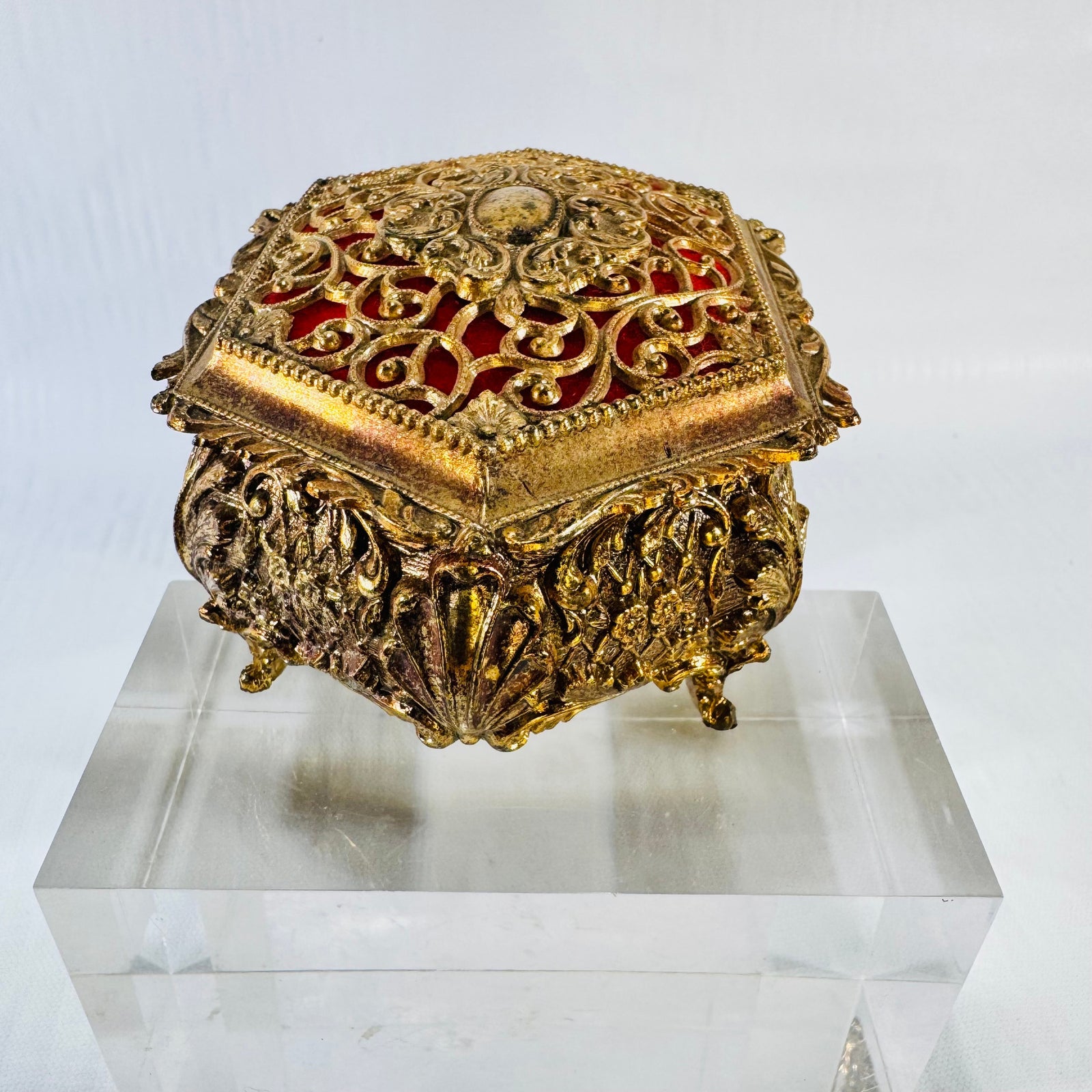 Vintage ornate gold tone metal jewelry casket with red fabric lining, photograph 4 of 9