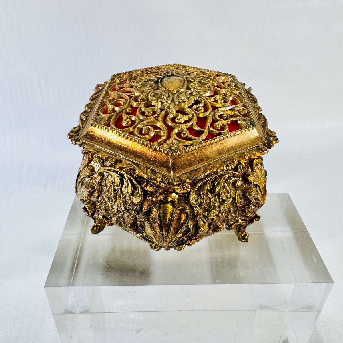 Vintage ornate gold tone metal jewelry casket with red fabric lining, photograph 6 of 9