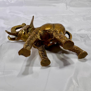 Bottom view of elephant showing legs, base, and casting texture underneath.