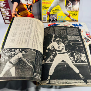 Assorted 1974–1980 baseball magazines and booklets arranged in a fan display, showing colorful covers and vintage MLB players.