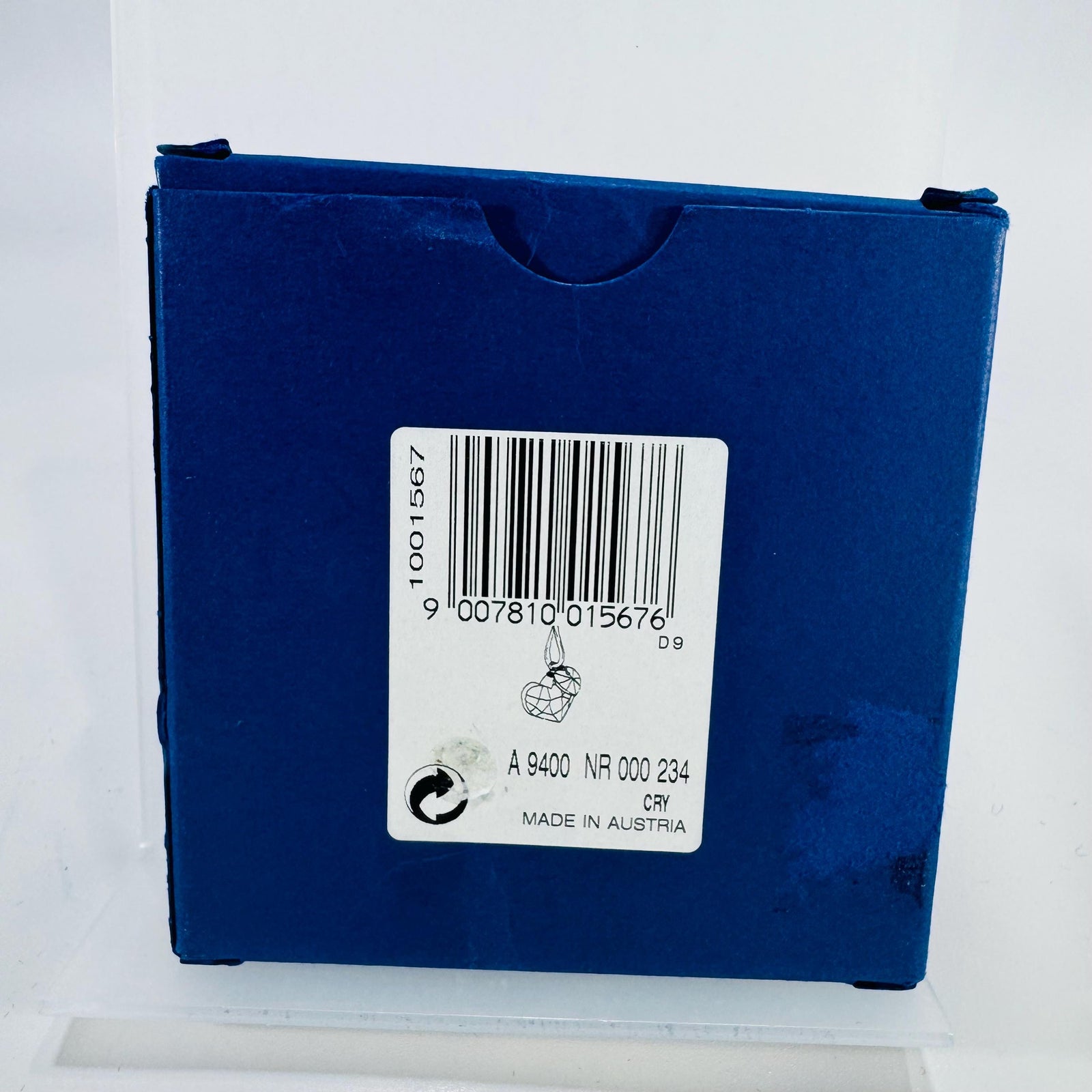 Swarovski Festive Hearts ornament in original blue box—faceted champagne Golden Shadow heart with small red Light Siam heart accent.